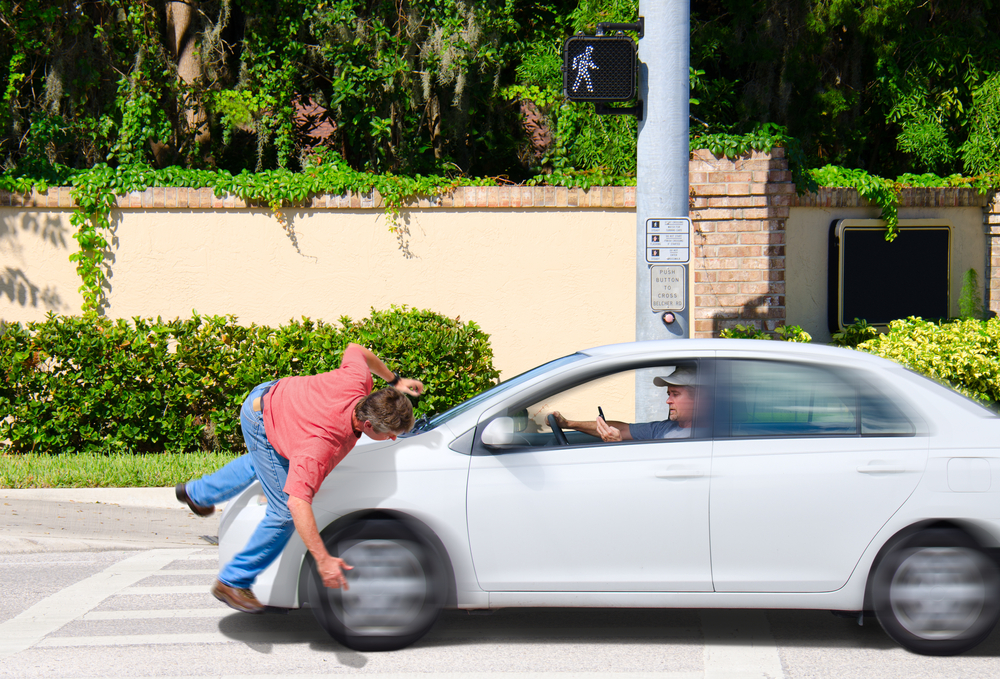A-man-that-is-texting-while-driving-runs-over-a-pedestrian