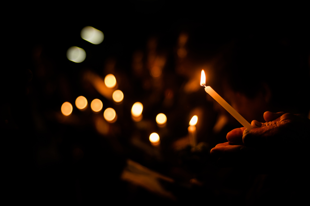 Candlelight-with-people-at-vigil