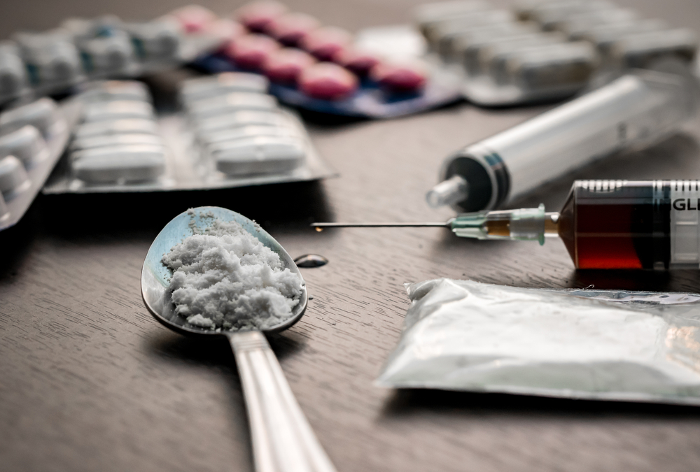 Drug-syringe-and-cooked-heroin-on-spoon