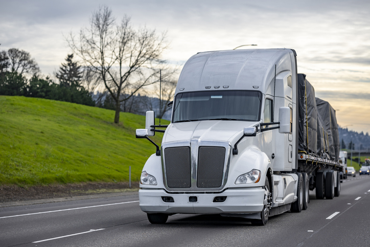 big rig semi truck on highway - can I sue a company for a commercial truck accident injury?
