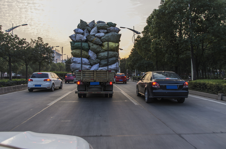 Overloaded truck on the road - How do you prove an overloaded truck caused a car accident?