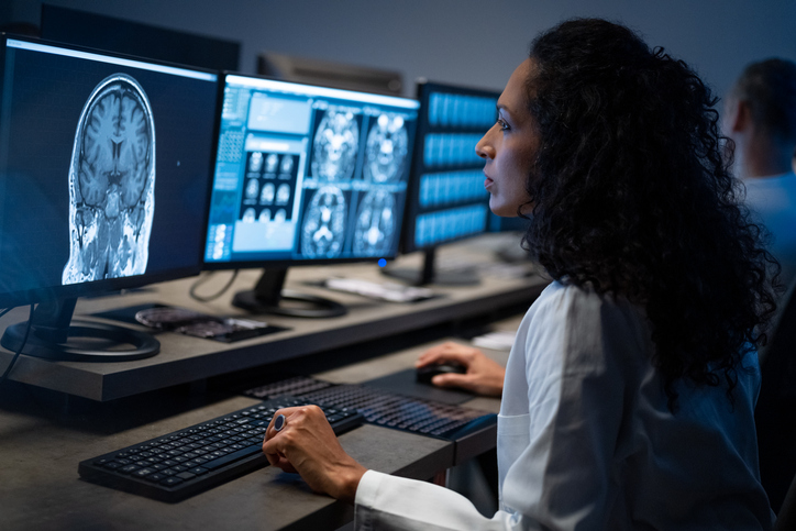 Doctor analyzing a brain scan - What happens when the cerebellum is damaged?